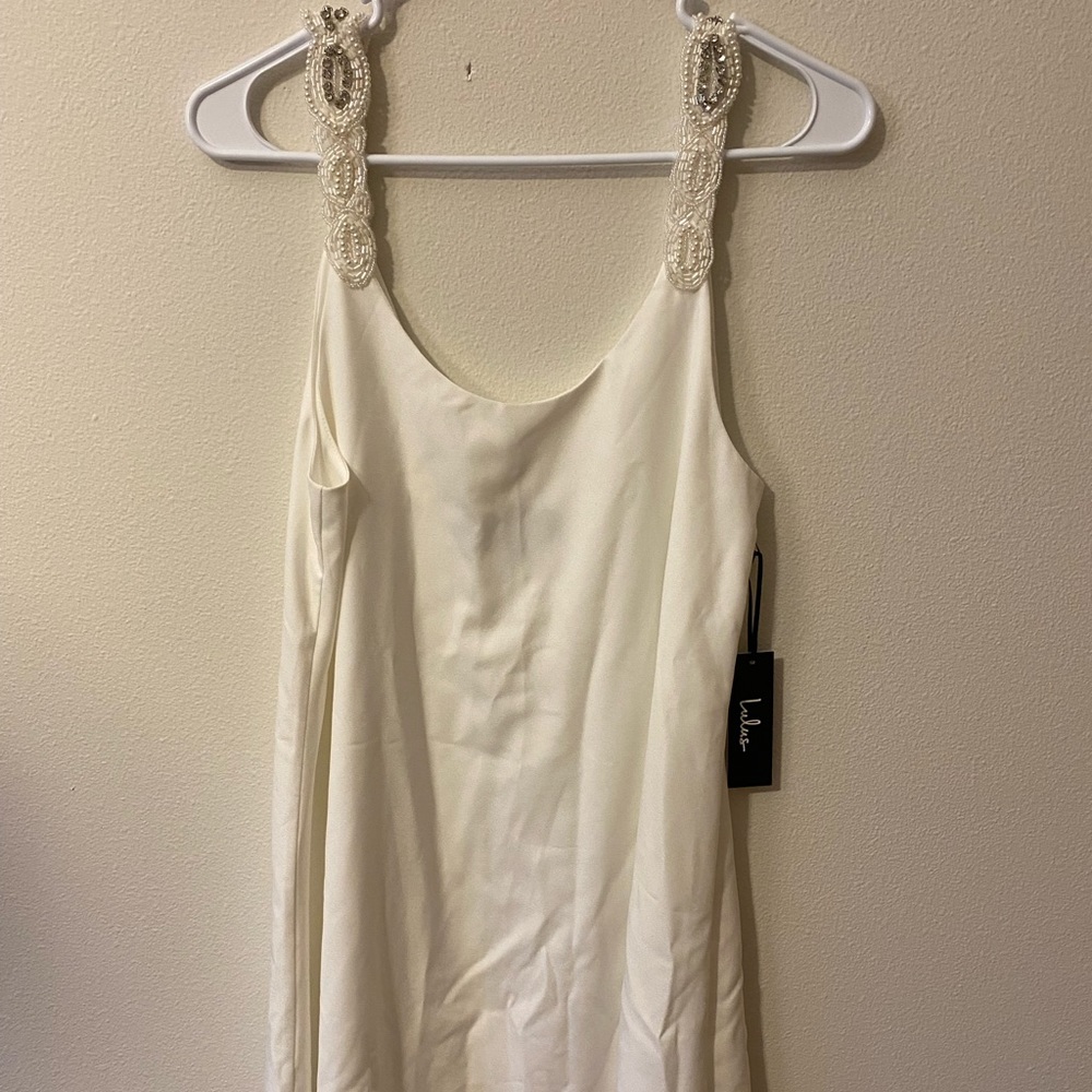 Brand: Lulu’s. Size: M. Color: Silver and white.